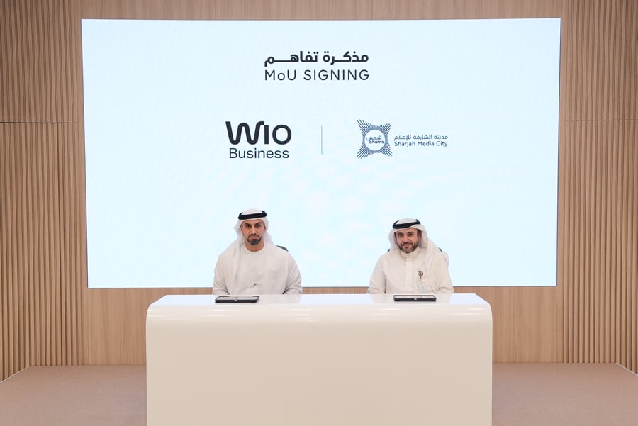 Shams and Wio Bank representatives at the memorandum of understanding signing